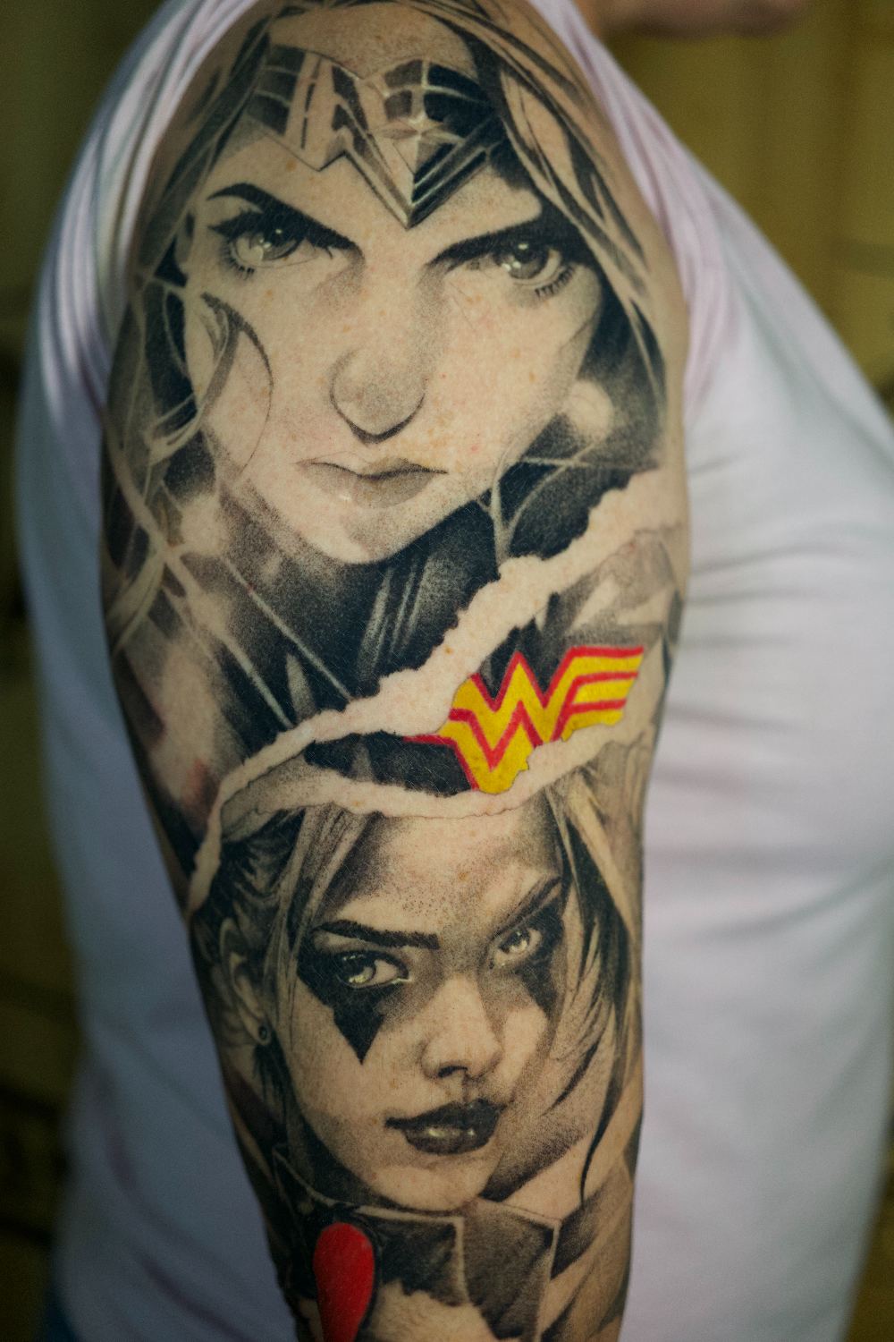 color anime heroine upper arm tattoo by Antwan Rodriguez, West Palm Beach FL