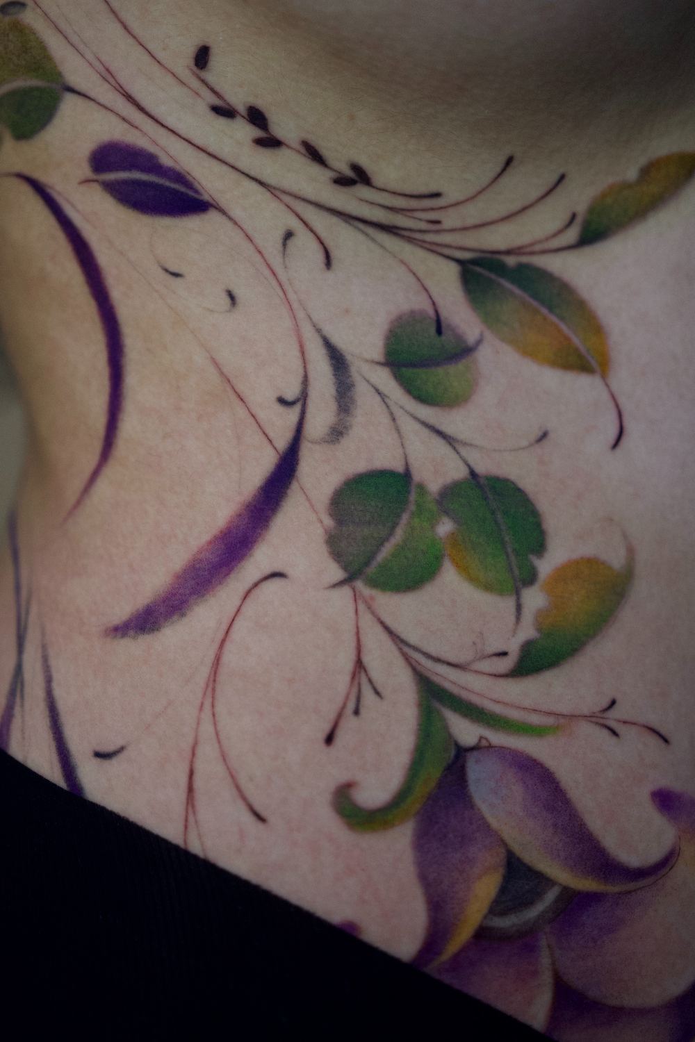 soft color floral shoulder tattoo by Antwan Rodriguez, West Palm Beach FL